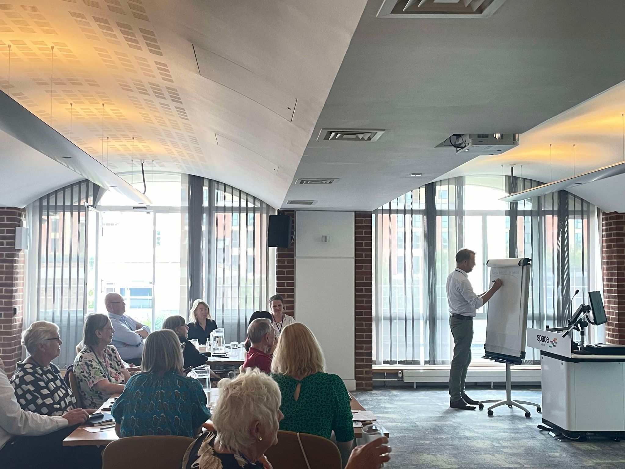 Dr Richard Simcock with flipchart
